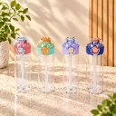 Four Colorful Bottles in Warm Studio Light.webp